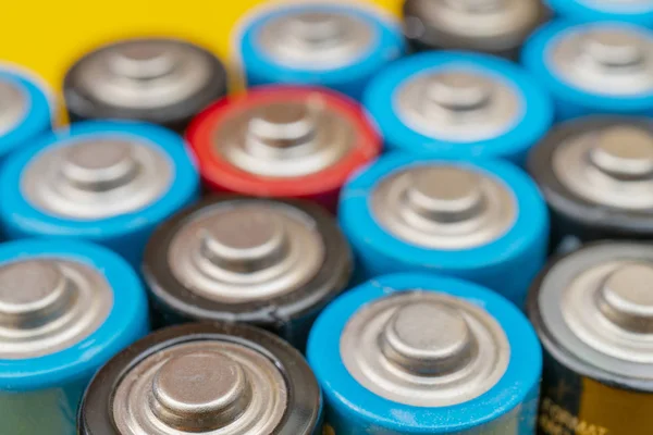 Used batteries. Waste collection and recycling. Environmental Protection. Batteries background.