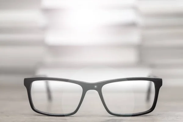 Glasses on the background of books. Symbol of knowledge, science — Stock Photo, Image