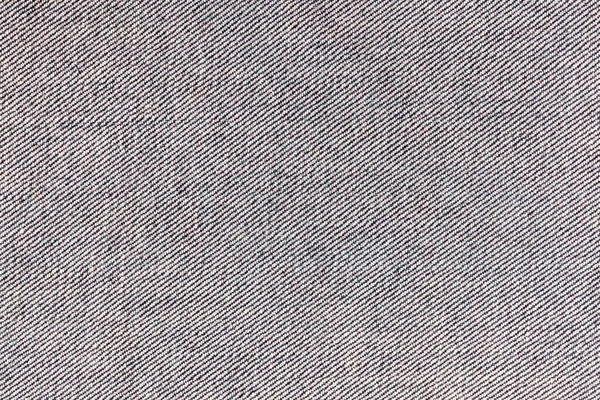 Siyah ve beyaz kumaş dokusunun soyut arkaplanı