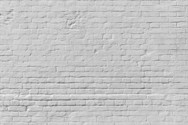 Renkli tuğla duvar dokusu. Çatı katı iç tasarımı. Açık gri cephe boyası.
