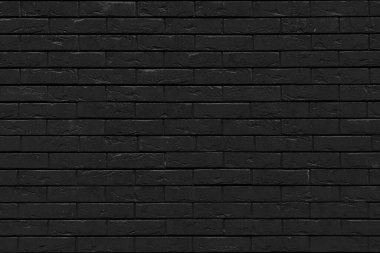 Renkli tuğla duvar dokusu. Çatı katı iç tasarımı. ön cephede siyah boya.