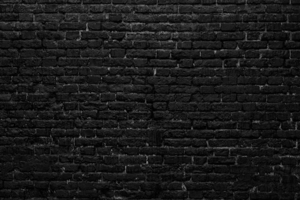 Background of black brick wall for design interior and various backdrops