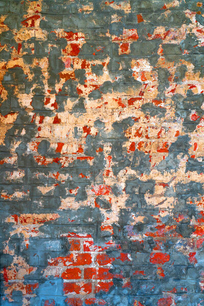 The background of the old red brick wall for design interior and various scenes or as a background for video interviews.