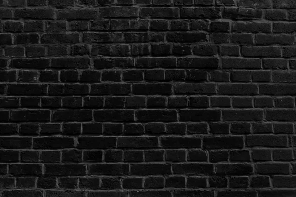 Background of black brick wall for design interior and various backdrops