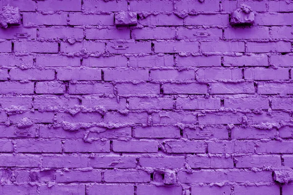 Background of purple brick wall for design interior and various backdrops