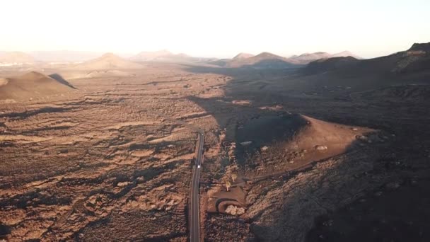 Volcanic landscape near Timanfaya, Lanzarote, Canary Islands. Aerial view — Stock Video