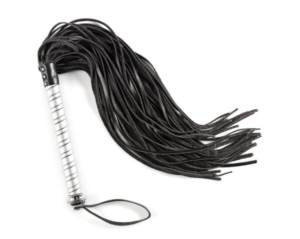 Flogger of whip in closeup on a white background