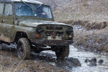 Old SUV car riding outdoors