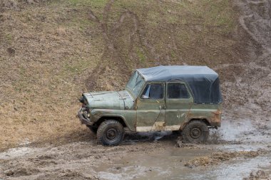 Old SUV car riding outdoors