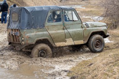 Old SUV car riding outdoors
