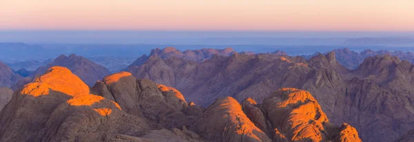 Amazing Sunrise at Sinai Mountain, Beautiful dawn in Egypt, Beautiful view from the mountain. Panorama.