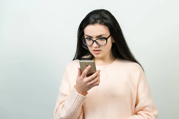 Beautiful Young Caucasian Woman Wear Glsses Using Smartphone White Background — Zdjęcie stockowe