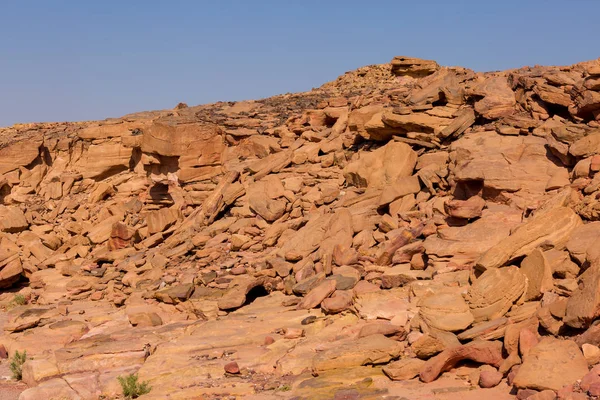 Desert rocks of multicolored sandstone background. Coloured Canyon is a rock formation on South Sinai (Egypt) peninsula.