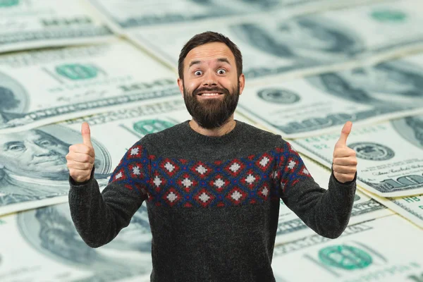 Young Bearded Man Showing Thumbs Dollar Banknotes Background — 스톡 사진