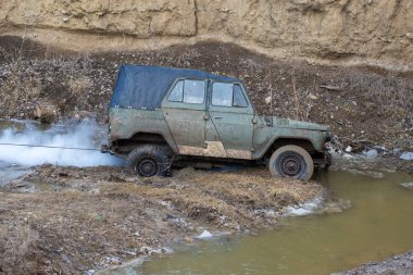 Old SUV car riding outdoors