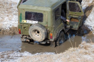 Old SUV car riding outdoors