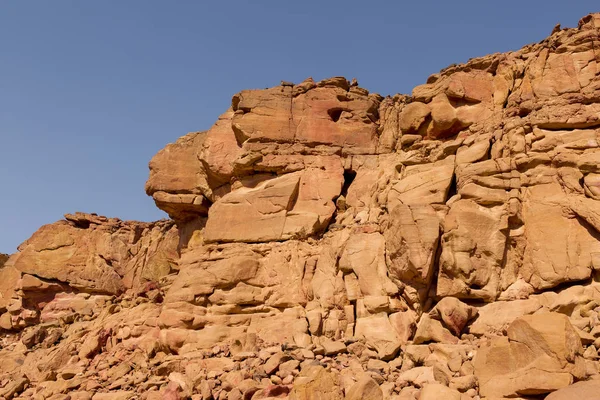 Desert rocks of multicolored sandstone background. Coloured Canyon is a rock formation on South Sinai (Egypt) peninsula.