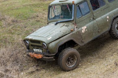 Old SUV car riding outdoors