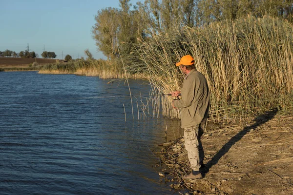 Fisherman Standing Riverside Trying Catch Fish Sport Recreation Lifestyle — Stock Photo, Image