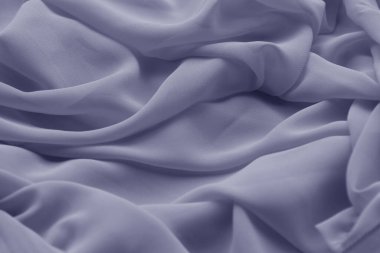 Mor ya da leylak renginde yumuşak bir kumaşın yakın çekimi