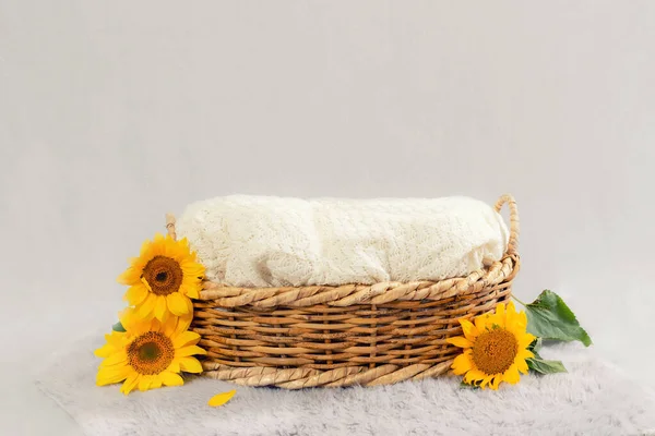 Basket for baby decorated with sunflower — Stock Photo, Image