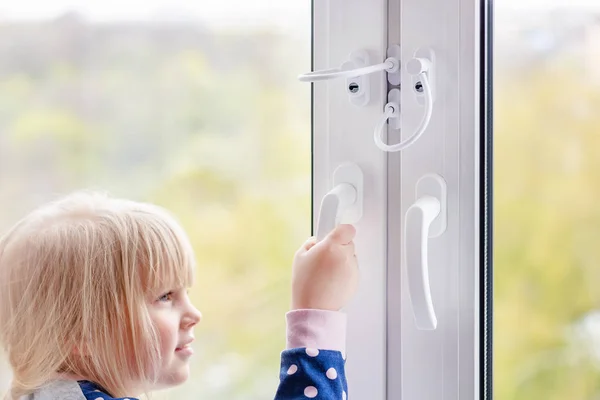 Little Cute Toddler Girl Trying Open Window Apartment High Tower — Stock Photo, Image