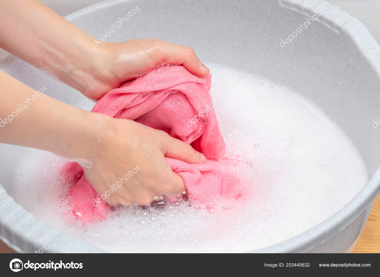 Woman Hand Washing Knitted Woolen Laundry Grey Plastic Basin Lot Stock