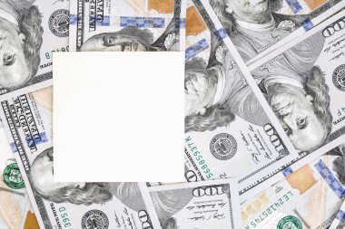 Para arka plan beyaz kağıt kare mockup ile. Metin için yer boşaltmak. Bize para birimi yüz dolarlık banknot arka plan. Finans, iş ve yatırım kavramı.