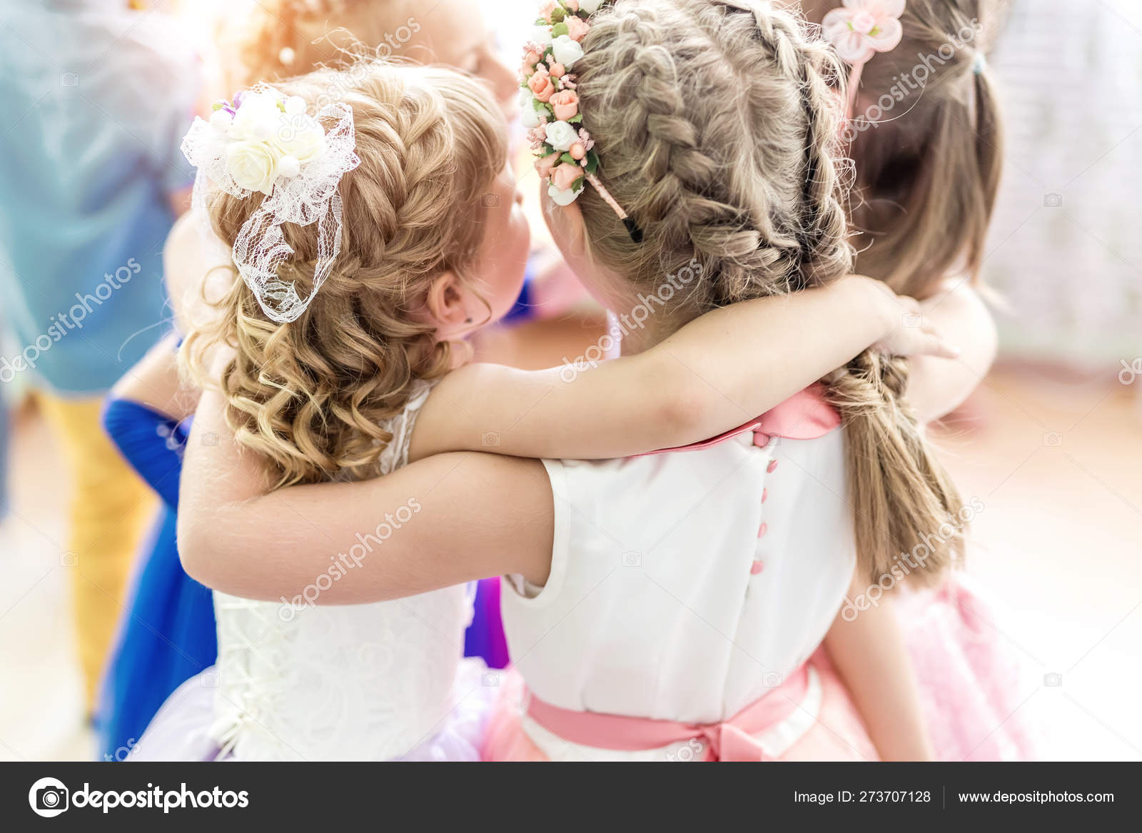 Many Little Girls Hugging Together In Round Dance Kids With
