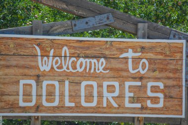 Welcome to Dolores Sign in San Juan National Forest, Colorado clipart