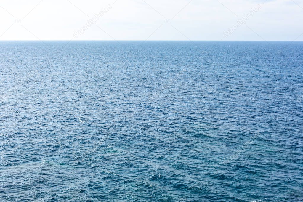 Blue and bright water surface of the Atlantic Ocean. Cool background.