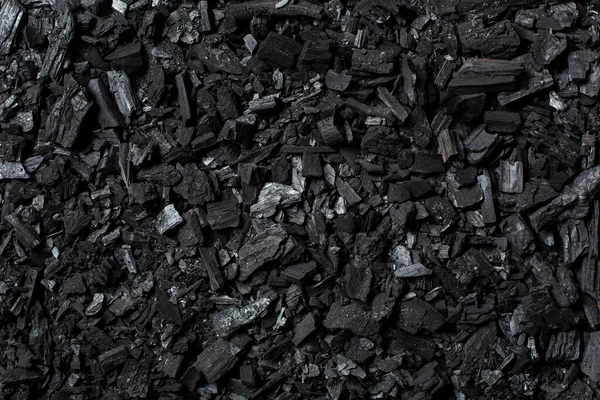 Fondo de carbón. Cruzando uniformemente el marco. Textura negra . —  Fotos de Stock