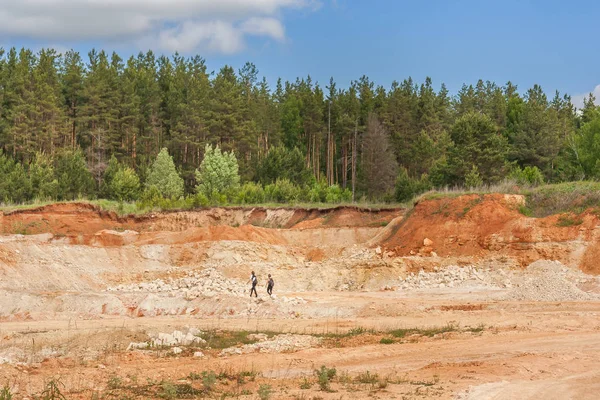 People in career on extraction of sand in the summer