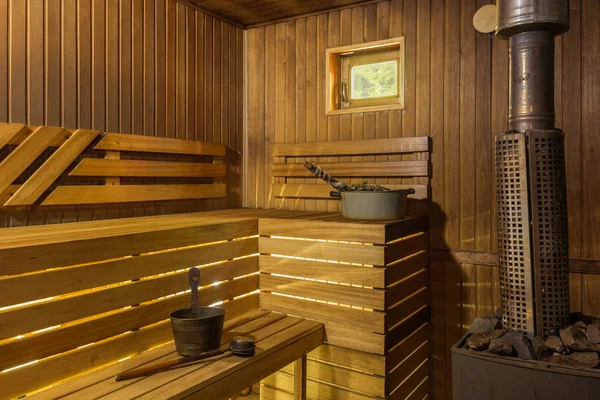 Steam room in the sauna with a stove heater