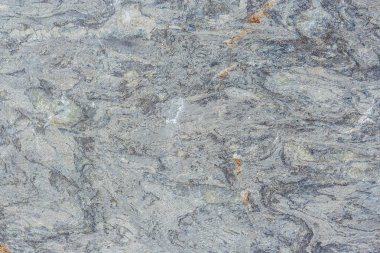 Kırmızımsı yamalar ile gri mermer dokusuna