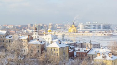 Church of Elijah the Prophet and Alexander Nevsky Cathedral in Nizhny Novgorod, in winter clipart
