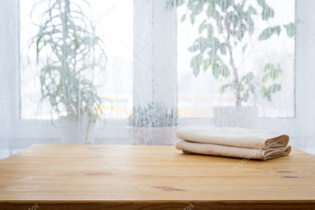 Table with a towel against the window