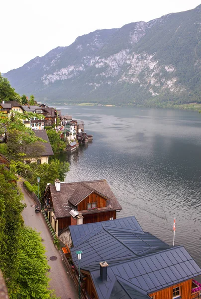 Old vintage wooden houses by the lake in Hallstatt, Austria.