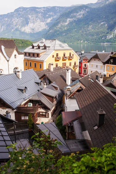 Old vintage wooden houses by the lake in Hallstatt, Austria.