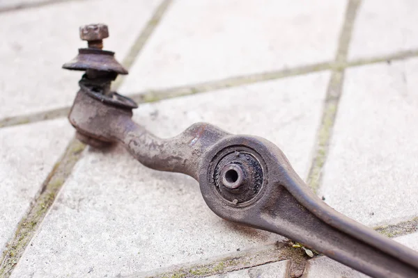 Old, used torn silent block of a classic car — Stock Photo, Image