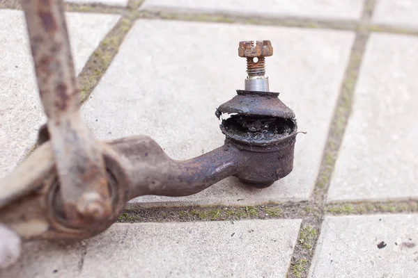 Old, used torn silent block of a classic car — Stock Photo, Image