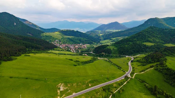 Aerial view from the heights of the road that runs through the Slovak Mountains with village