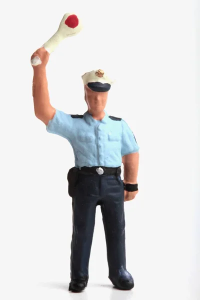 traffic policeman miniature monitoring and directing the urban traffic