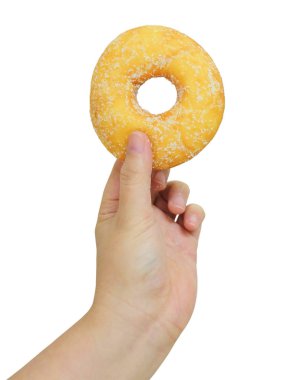 Yemek ve ekmek, beyaz arka plan üzerinde izole şeker Toppings ile lezzetli taze ve tatlı çörek tutan el.