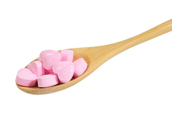 Konsep Healthcare Close Wooden Spoon Full Pink Heart Shape Vitamins — Stok Foto