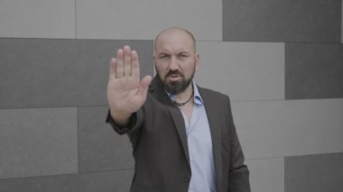Stop el hareketi şehir'ın inkar ifade sokak gösterilen ciddi iş adamı