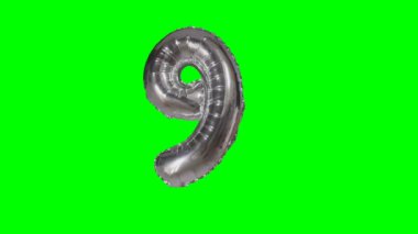 9 dokuz yıl Doğum Yıldönümü gümüş helyum balon yeşil ekranda kayan sayı