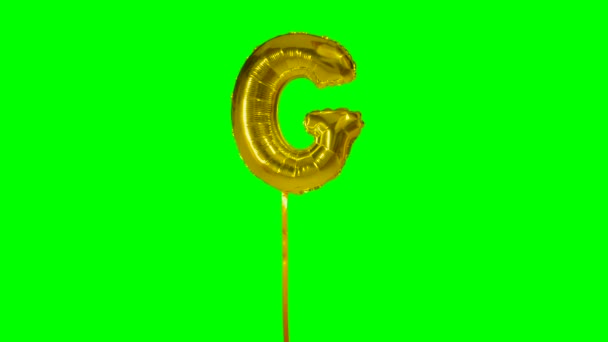 Letter Alfabet Goud Helium Ballon Zwevend Groen Scherm — Stockvideo