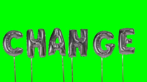 Cambio de palabras de letras de globos de plata de helio flotando en pantalla verde — Vídeo de stock