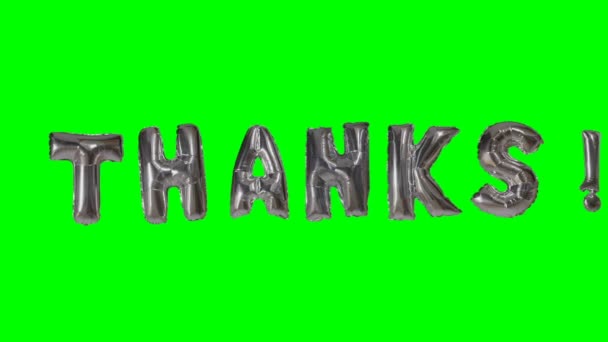 ヘリウムから単語のおかげで銀のバルーン文字が浮かぶ緑色の画面 — ストック動画